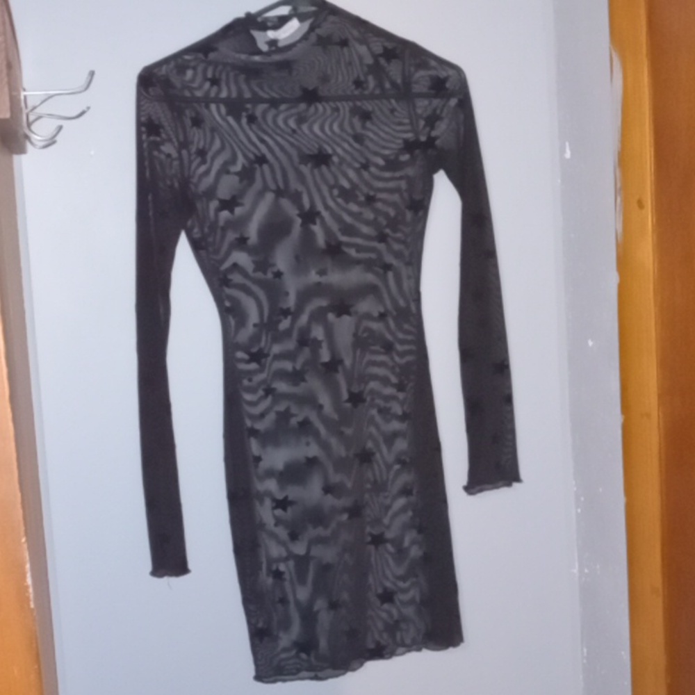 See through black starred long-sleeved dress